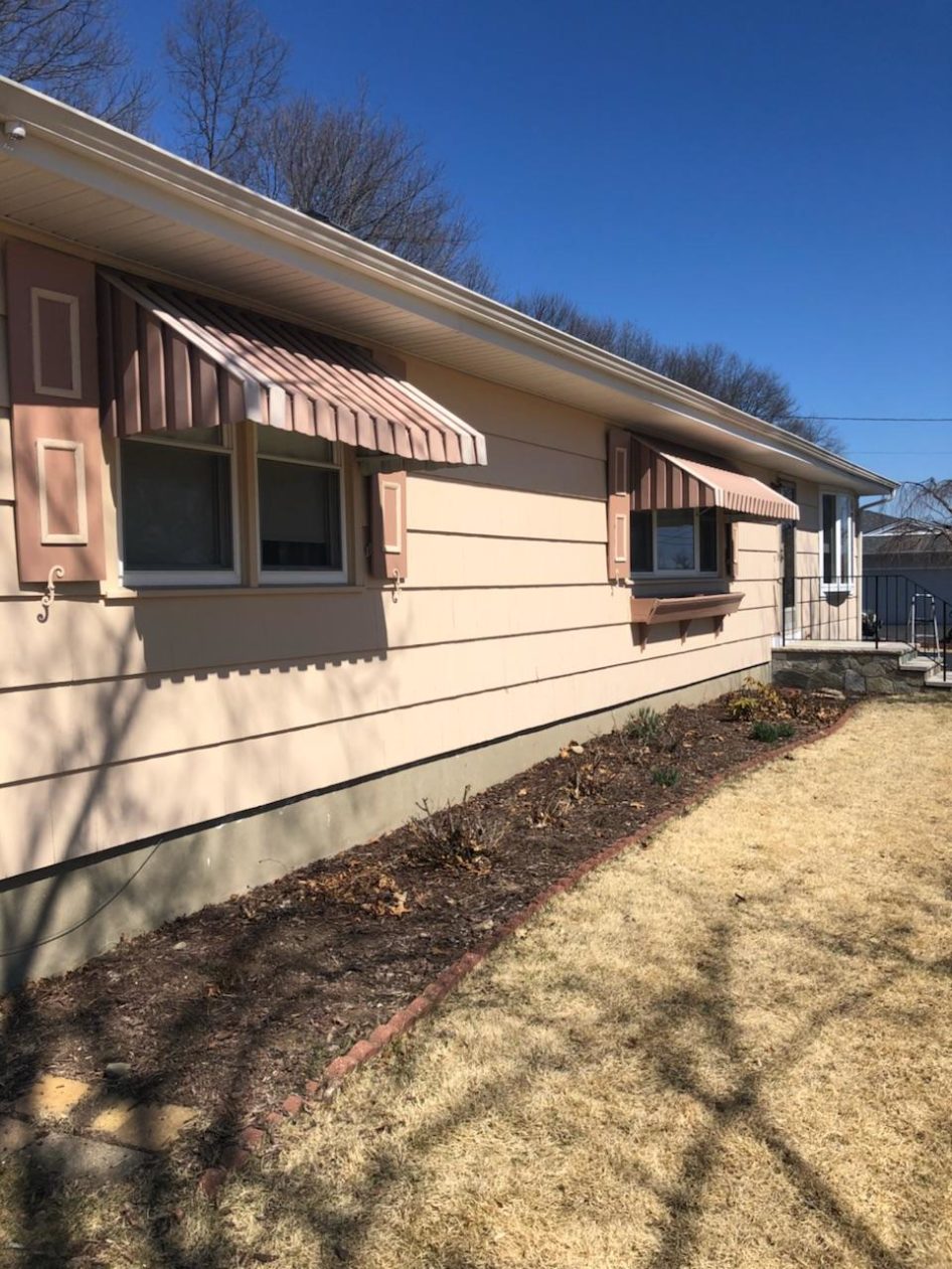 Home Makeover With Cedar Impressions Vinyl Siding in Stratford CT
