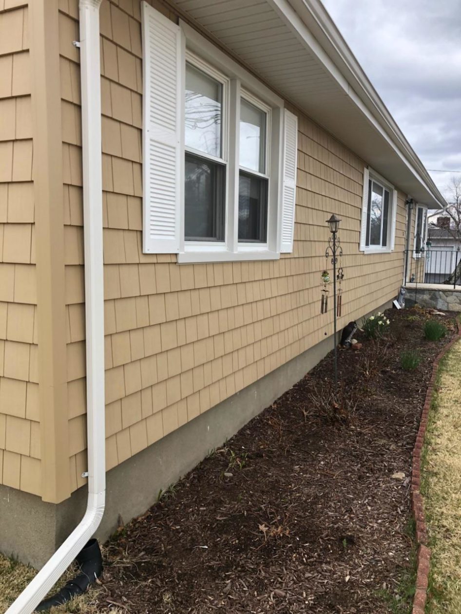 Home Makeover With Cedar Impressions Vinyl Siding in Stratford CT